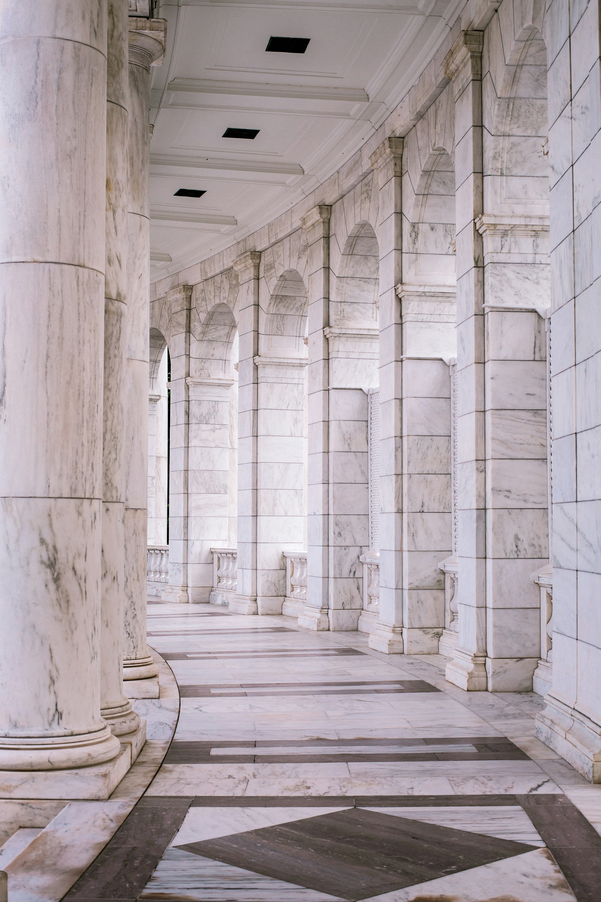 A classical marble colonnade: permanence, judgment and order.